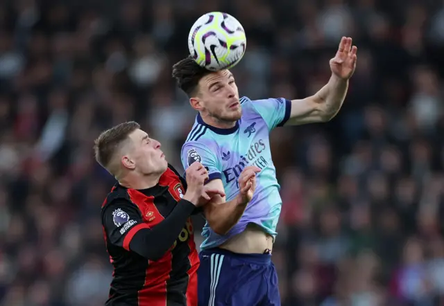 Rice wins a header in midfield