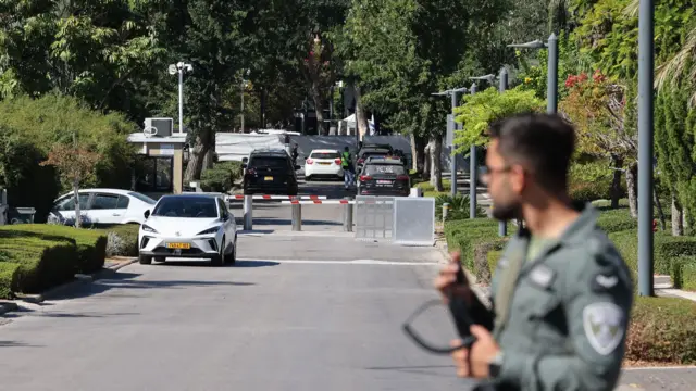 Israeli police at the scene targeted by unmanned aerial vehicle (UAV) fired from Lebanon, in Caesarea, Israel