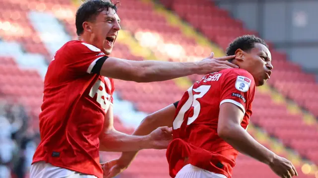 Rarmani Edmonds-Green celebrates his equaliser for Charlton