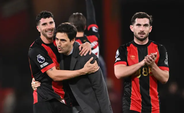 Iraola hugs his players on the pitch at full time