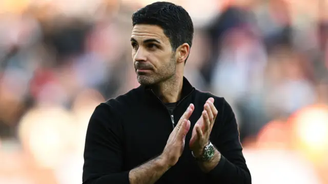 Mikel Arteta acknowledges the fans after a Premier League match