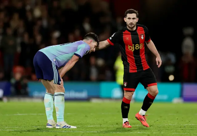 Cook shakes hands with Rice at full time