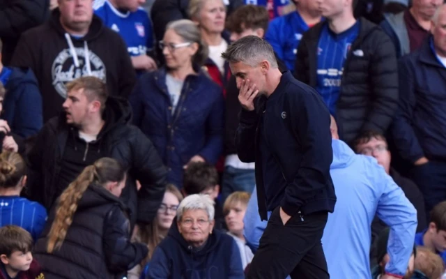 Kieran McKenna walks off the pitch