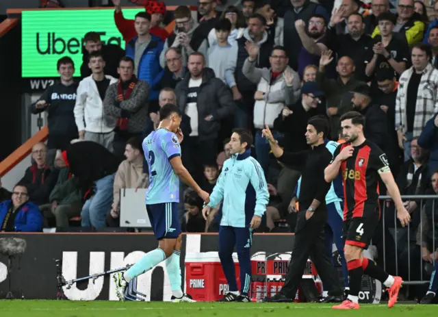 Saliba walks off after seeing red