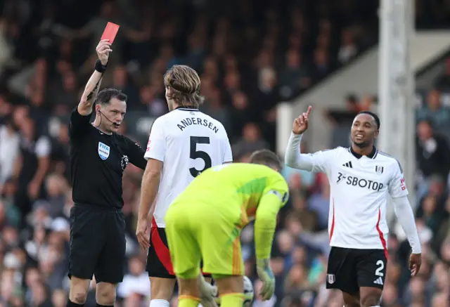 Match Referee, Darren England shows a red card