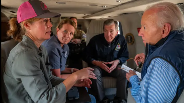 Joe Biden flies in a helicopter above North Carolina