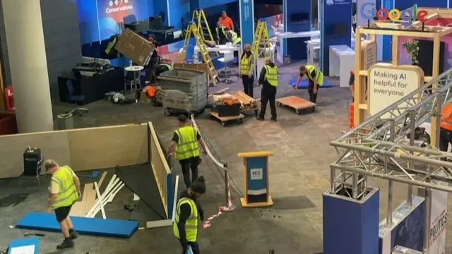 People begin packing up the conference