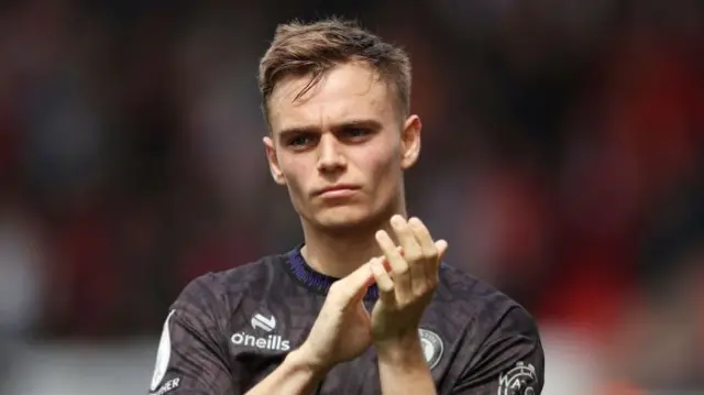 Scott Twine applauding Bristol City fans during their match against Swansea