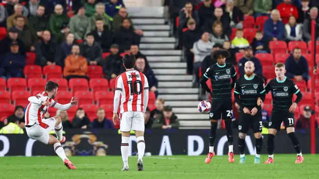 Thomas Cannon of Stoke City scores the opening goal