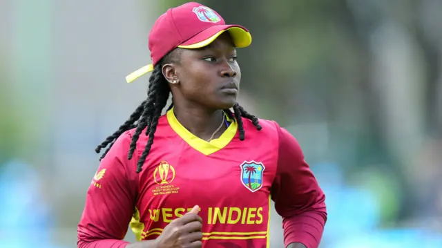 Deandra Dottin of West Indies looks on during a 2022 ICC Women's World Cup match against Australia