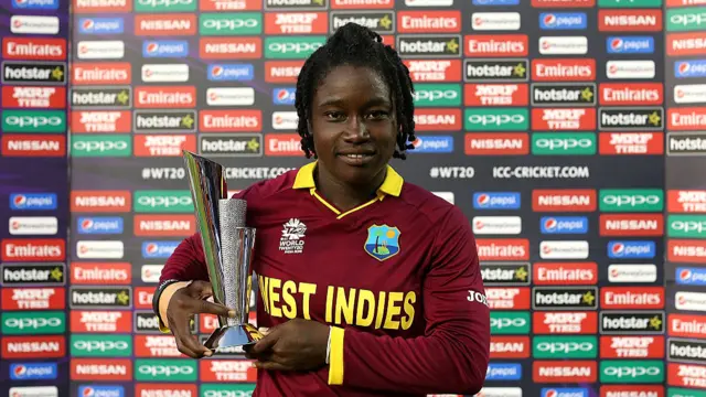 Deandra Dottin posing with the player of the match trophy after a 2016 Women's T20 World Cup match between West Indies and India