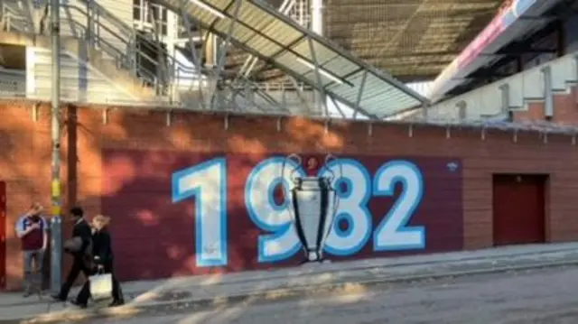 View of UCL mural outside Villa Park