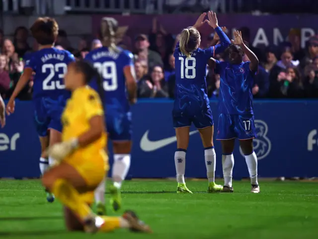 Chelsea celebrate as Spurs keeper Spencer gathers herself