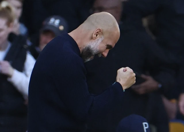 Pep Guardiola celebrates