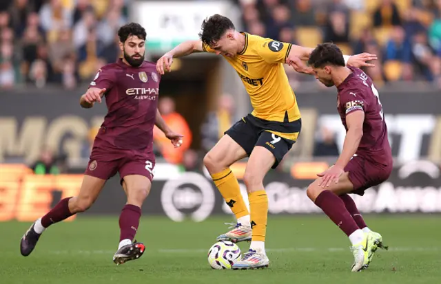 Joergen Strand Larsen of Wolverhampton Wanderers battles for possession