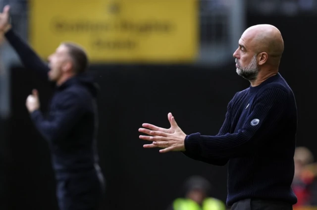 Pep Guardiola and Wolverhampton Wanderers manager Gary O'Neil