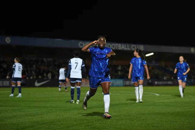 Sandy Baltimore of Chelsea celebrates