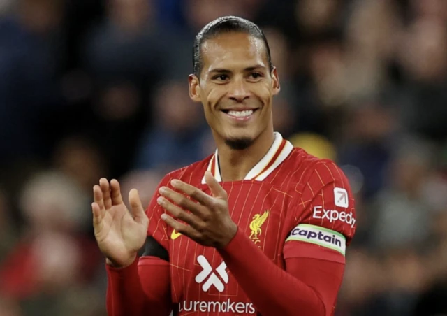 Liverpool's Virgil van Dijk applauds fans