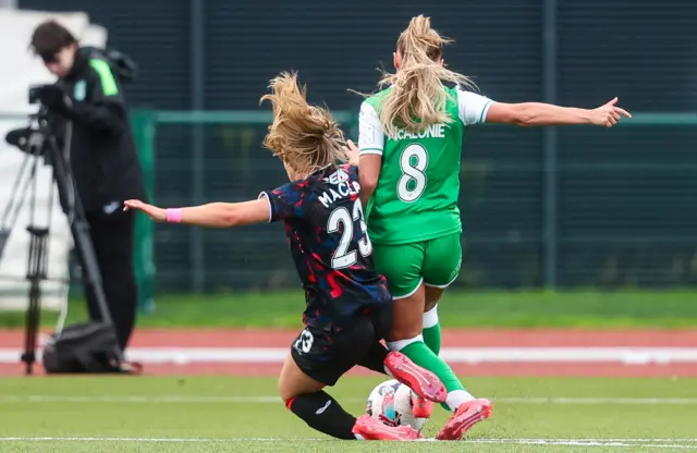 Kirsty Maclean catches Michaela McAlonie just inside the box