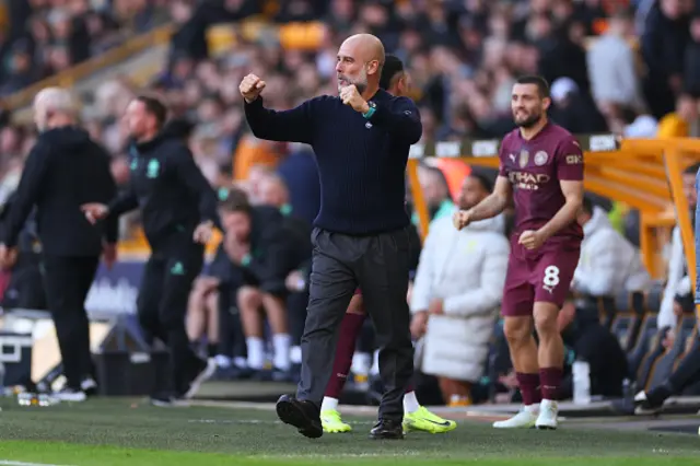 Pep Guardiola manager of Manchester City celebrates