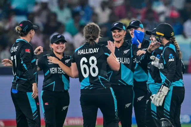 Brooke Halliday and New Zealand celebrate a wicket