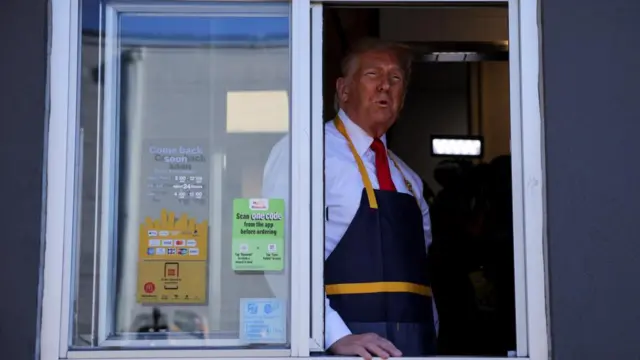 Donald Trump appears in the McDonald's drive-thru