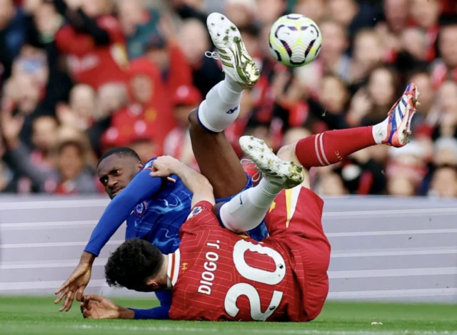 Liverpool's Diogo Jota is fouled by Chelsea's Tosin Adarabioyo