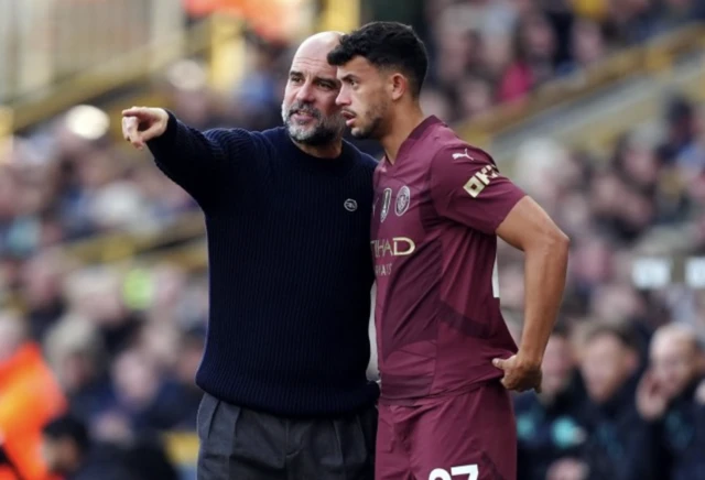 Pep Guardiola speaks to Nunes