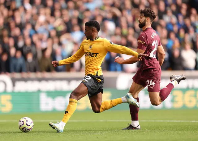 Nelson Semedo of Wolverhampton Wanderers runs with the ball