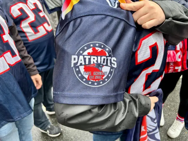 A fans' sleeve showing the New England Patriots' Germany fans' group