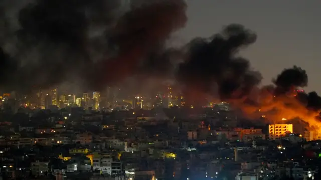 An orange light and smoke seen on the Beirut skyline