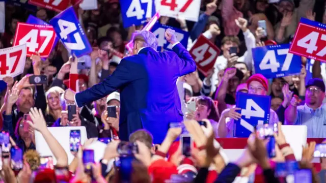 Trump dances as he departs a town hall campaign event in Lancaster, Pennsylvania