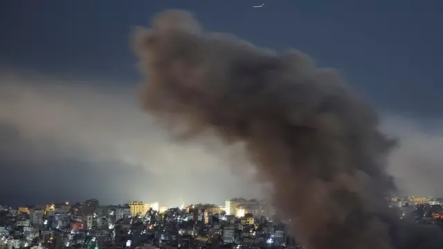 Smoke billows over Beirut's southern suburbs after an Israeli strike, amid the ongoing hostilities between Hezbollah and Israeli forces, as seen from Baabda, Lebanon