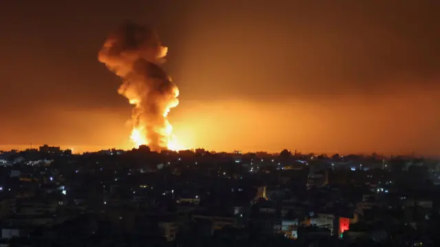 Smoke and flames billows over Beirut's southern suburbs after an Israeli strike, amid the ongoing hostilities between Hezbollah and Israeli forces, as seen from Baabda, Lebanon