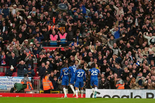 Chelsea fans celebrate their goal at Anfield