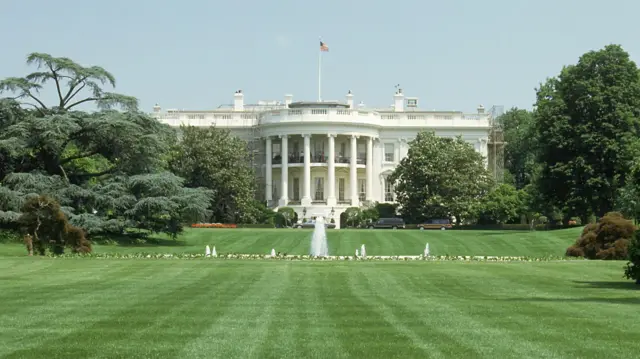 Frontal view of the White House from a distance