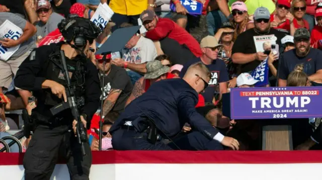 Secret Service on stage moments after Trump was shot