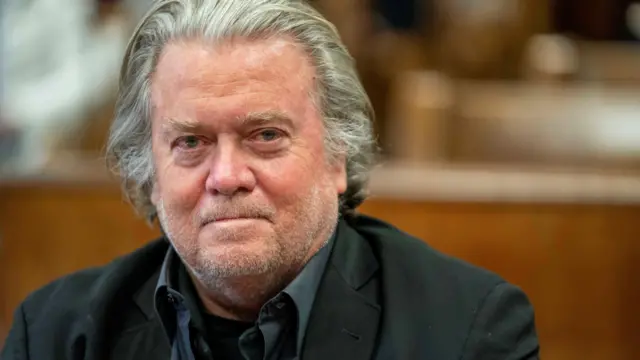 Former White House Chief Strategist Steve Bannon sits during his appearance at New York Supreme Court after a hearing in New York City, U.S., January 12, 2023.