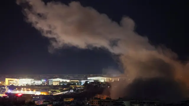 Smoke billows over Beirut's southern suburbs after an Israeli strike, amid the ongoing hostilities between Hezbollah and Israeli forces, as seen from Baabda, Lebano