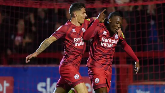 Rushian Hepburn-Murphy celebrates scoring Crawley's third goal against Lincoln