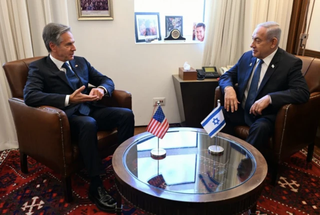 A handout photo made available by Israel's Government Press Office shows Israeli Prime Minister Benjamin Netanyahu and US Secretary of State Antony Blinken