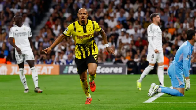 Borussia Dortmund's Donyell Malen celebrates scoring their first goal