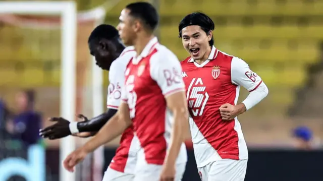 Monaco's Takumi Minamino reacts after scoring the opening goal