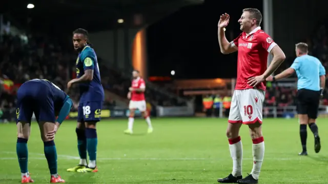 Wrexham's Paul Mullin reacts to a missed chance against Huddersfield