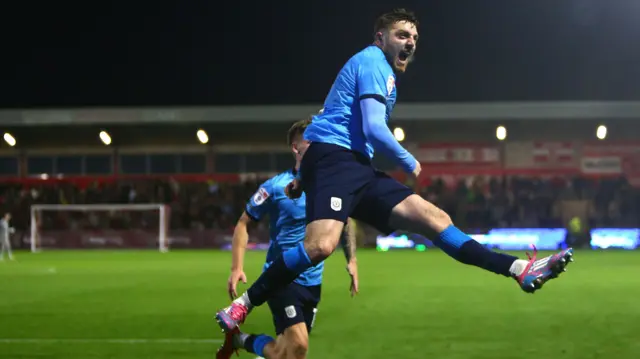 Ryan Cooney celebrates scoring for Crewe