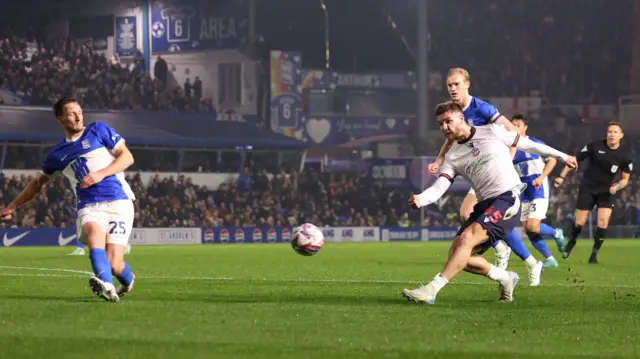 Bolton's John McAtee shoots at goal against Birmingham