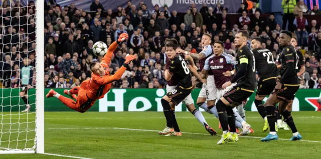 Bologna's goalkeeper Lukasz Skorupski is beaten by delivery from Aston Villa's John McGinn