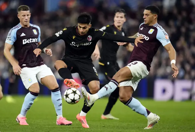 Bologna's Santiago Castro and Aston Villa's Diego Carlos in action