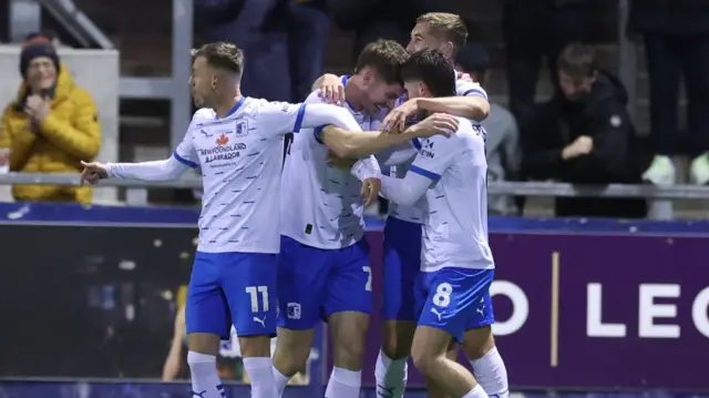 Barrow players celebrate Rory Feely's opener against Notts County