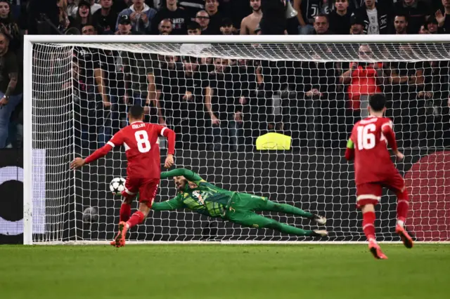 Mattia Perin saves a penalty quick of Stuttgart's French midfielder Enzo Millot